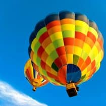 Camping le Bontemps Ciela Village two hot air balloons flying in the blue sky